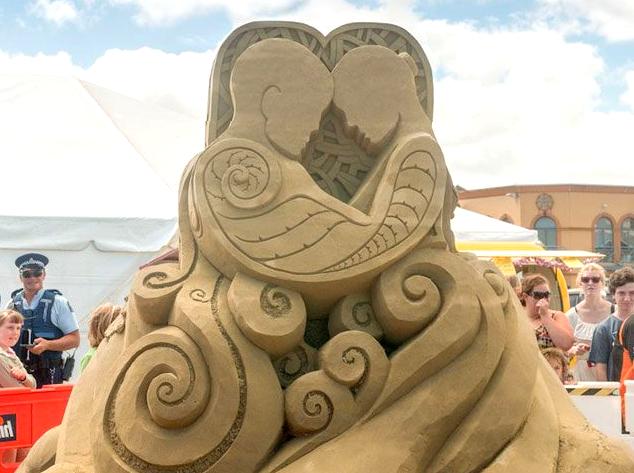 Sand Sculpture Competition: Competing in a fun sand sculpture competition.